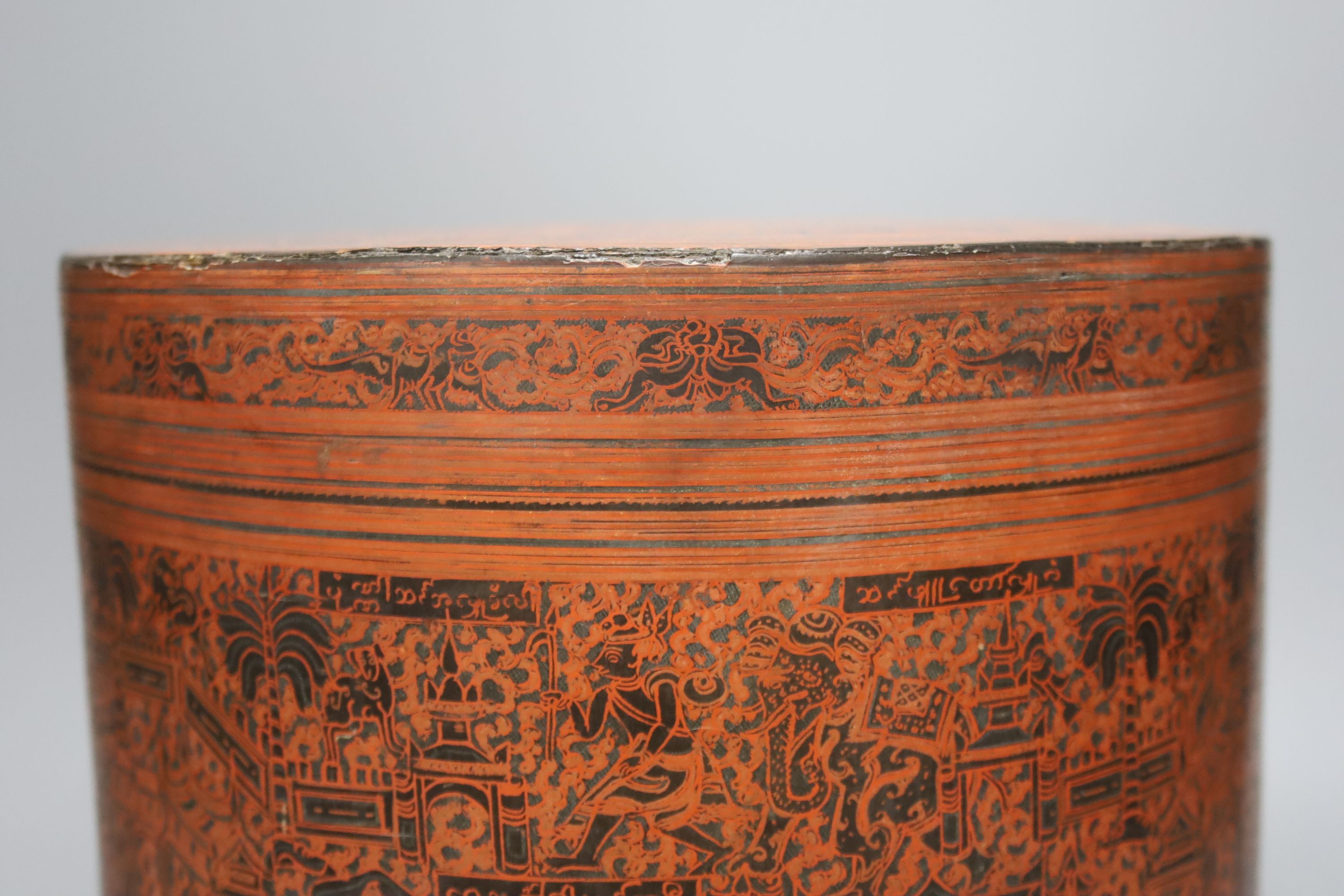A large Burmese red and black lacquer betel box and cover with internal tray, late 19th century, 22cm
